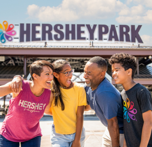 Family of four enjoying Hershey Park